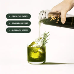 Verve V80 Transparent Greens healthy drink being poured into a luxury glass with ice and garnish. Benefits: Crash-free energy – check, Immunity support – check, Gut health sorted – check.