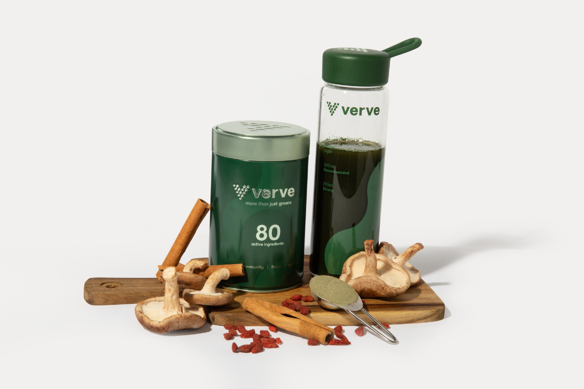 Verve bottle and tin on a board with mushrooms and cinnamon 