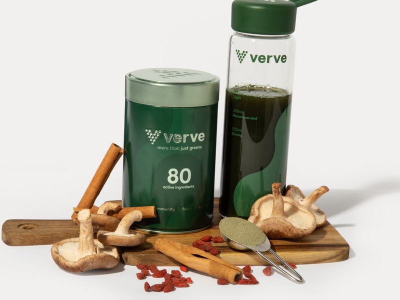 Verve bottle and tin on a board with mushrooms and cinnamon 