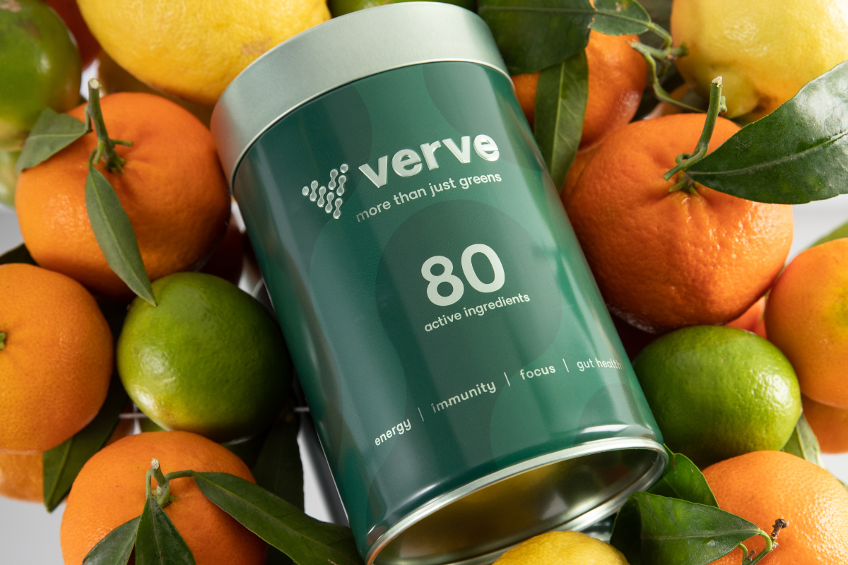 Verve Tin resting on oranges and lemons