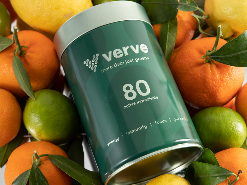 Verve Tin resting on oranges and lemons