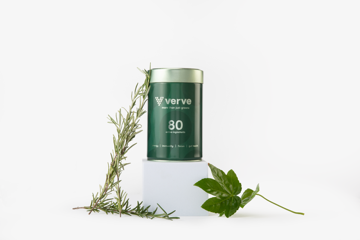 tin on pedestal with rosemary 