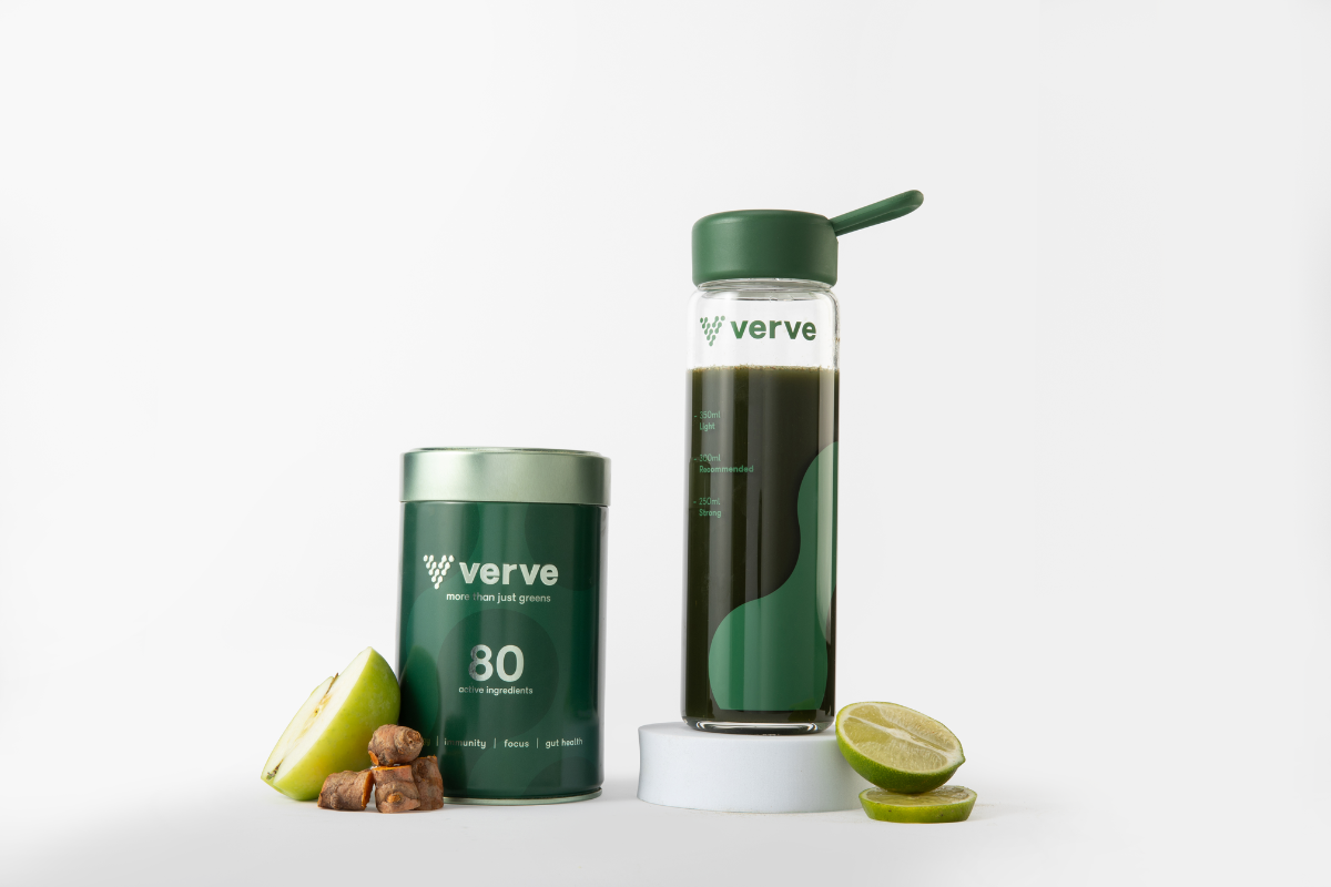 tin with bottle on pedestal