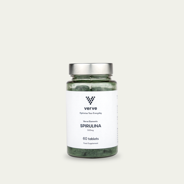Clear glass bottle with silver lid containing green tablets, labelled "Verve Elements Spirulina 500mg, 60 tablets".